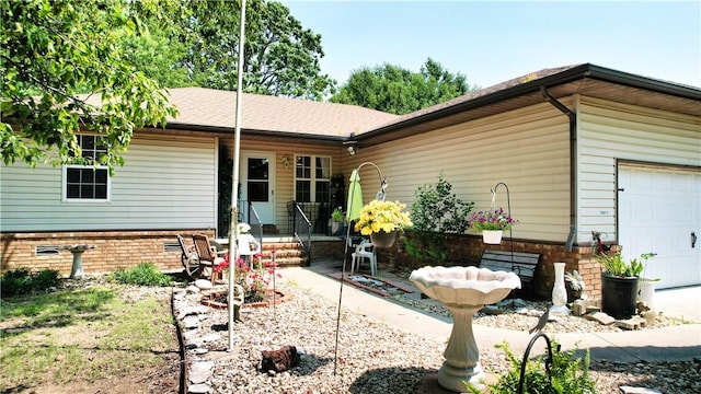 15829 N Wimpy Jones Rd, Garfield, AR 72732 - single story home featuring brick siding and an attached garage