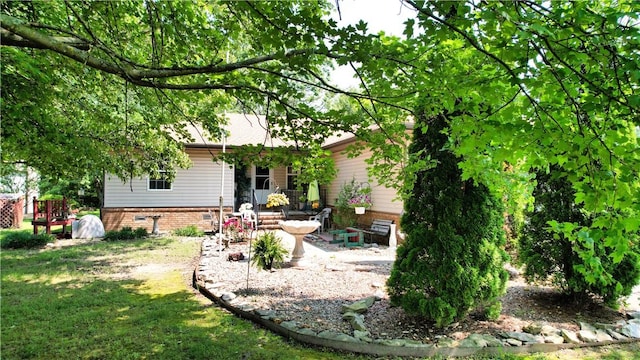 15829 N Wimpy Jones Rd, Garfield, AR 72732 - rear view of house with a patio and a yard