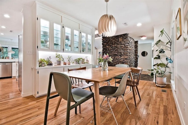 1463 E Woodbrook Dr, Fayetteville, AR 72703 - dining space featuring light wood-style floors, recessed lighting, and baseboards