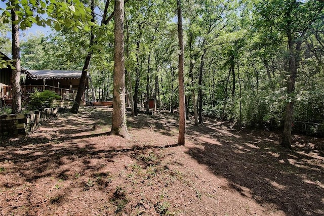 1463 E Woodbrook Dr, Fayetteville, AR 72703 - view of yard featuring a wooden deck