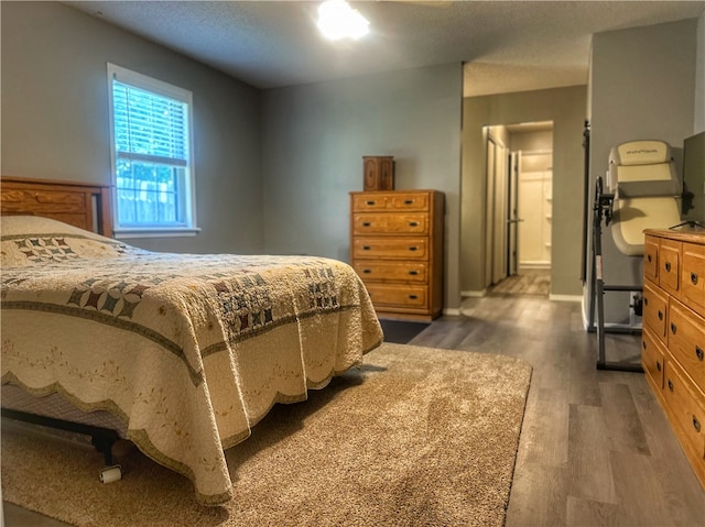 3002 W 4th St, Russellville, AR 72801 - bedroom with wood finished floors