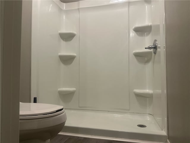 3002 W 4th St, Russellville, AR 72801 - full bath with a shower, wood finished floors, and toilet