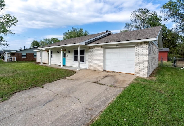 1205 Jo Lynn St, Siloam Springs, AR 72761 - ranch-style home with a porch, brick siding, an attached garage, and concrete driveway