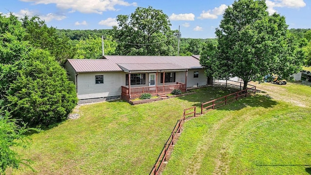 1188 Kyle Rd, Noel, MO 64854 - ranch-style house featuring metal roof, a porch, and a wooded view