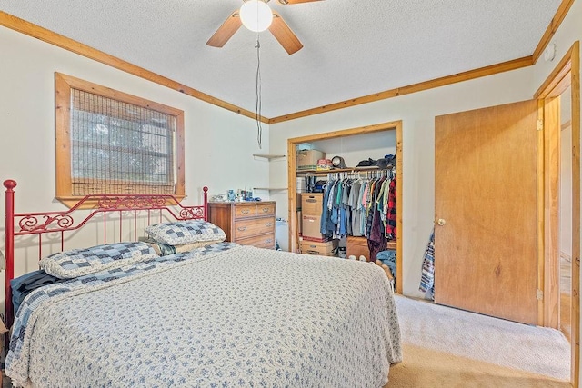 1188 Kyle Rd, Noel, MO 64854 - carpeted bedroom featuring a textured ceiling, a closet, crown molding, and ceiling fan