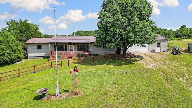 1188 Kyle Rd, Noel, MO 64854 - view of front facade featuring metal roof and a garage