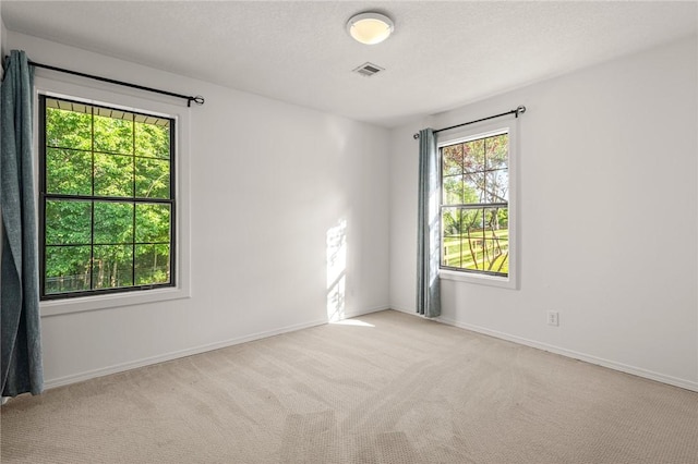 3307 NW 3rd St, Bentonville, AR 72712 - carpeted spare room featuring baseboards