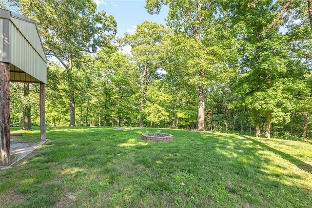 3307 NW 3rd St, Bentonville, AR 72712 - view of green lawn featuring a fire pit