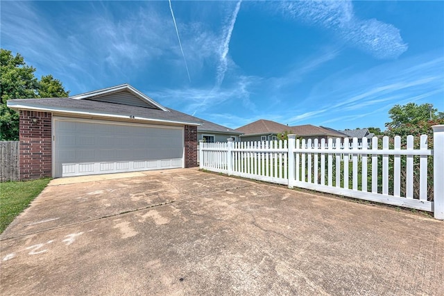64 Cheryl Cir, Bentonville, AR 72712 - view of front facade featuring brick siding and driveway