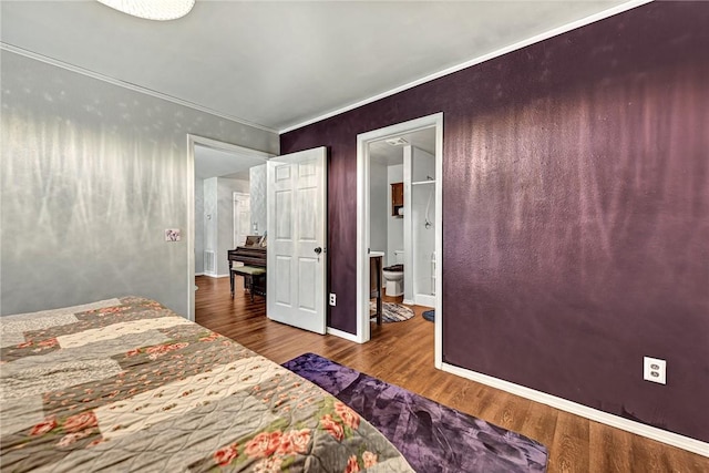 64 Cheryl Cir, Bentonville, AR 72712 - bedroom with wood finished floors, crown molding, and baseboards