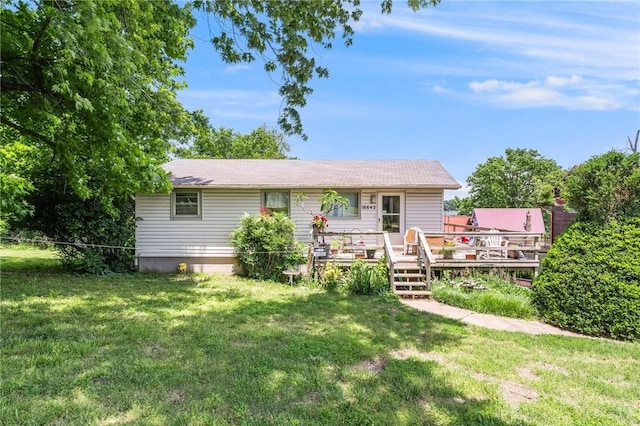 16642 Cypress Ln, Rogers, AR 72756 - rear view of property featuring a deck and a yard