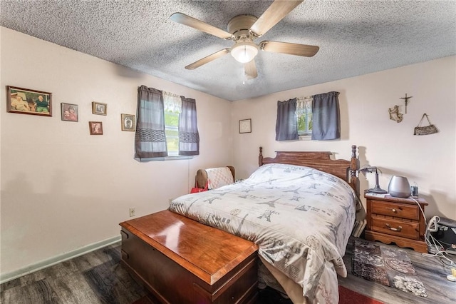 16642 Cypress Ln, Rogers, AR 72756 - bedroom featuring wood finished floors, a textured ceiling, baseboards, and ceiling fan
