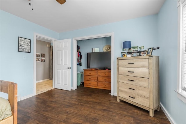 4220 S 7th Hwy, Harrison, AR 72601 - bedroom featuring dark wood finished floors, baseboards, and ceiling fan