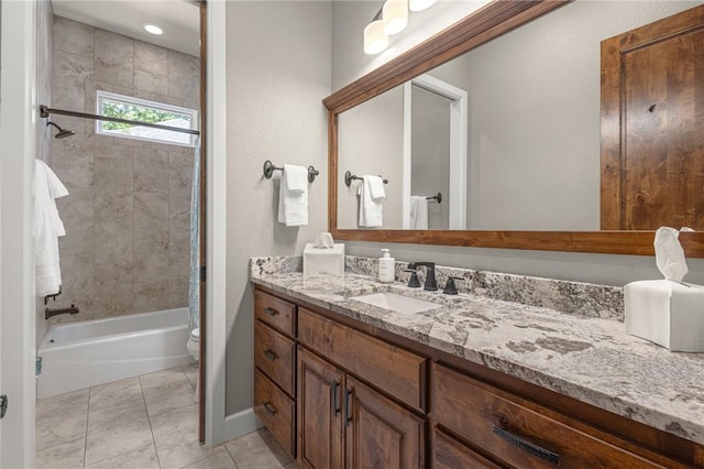 42 Devizis Dr, Bella Vista, AR 72714 - full bathroom featuring vanity, toilet, shower / bath combo, tile patterned flooring, and baseboards