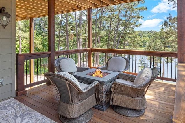 42 Devizis Dr, Bella Vista, AR 72714 - deck with an outdoor fire pit