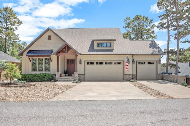 42 Devizis Dr, Bella Vista, AR 72714 - craftsman inspired home featuring concrete driveway, a shingled roof, board and batten siding, and stone siding