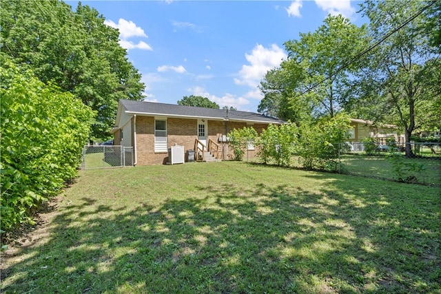 3021-3023 N Old Missouri Rd, Fayetteville, AR 72703 - rear view of house with brick siding and central AC unit