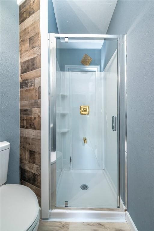 2532 E 4th St, Tulsa, OK 74104 - bathroom with toilet, a stall shower, and a textured wall