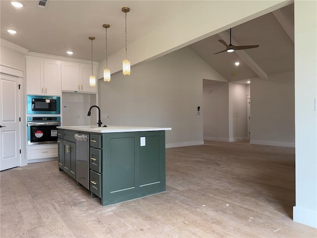 7695 Teton Trl, Springdale, AR 72762 - kitchen featuring stainless steel appliances, white cabinetry, a sink, ceiling fan, and light countertops