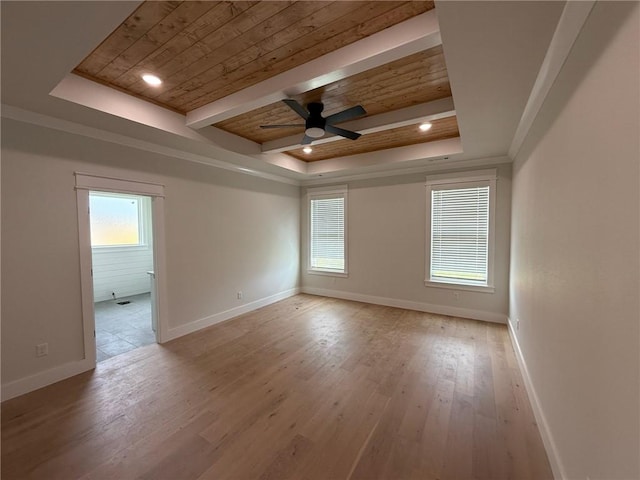 7695 Teton Trl, Springdale, AR 72762 - empty room with a tray ceiling, wooden ceiling, baseboards, a ceiling fan, and plenty of natural light