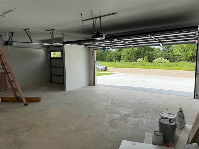 7695 Teton Trl, Springdale, AR 72762 - garage featuring a garage door opener