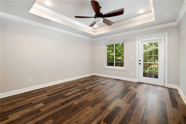 17 Webbly Ln, Bella Vista, AR 72714 - spare room with a tray ceiling, dark wood-type flooring, ceiling fan, baseboards, and ornamental molding