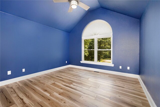 17 Webbly Ln, Bella Vista, AR 72714 - unfurnished room with lofted ceiling, a ceiling fan, wood finished floors, and baseboards