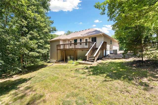 17 Webbly Ln, Bella Vista, AR 72714 - rear view of property featuring stairway, central AC, a wooden deck, and a yard