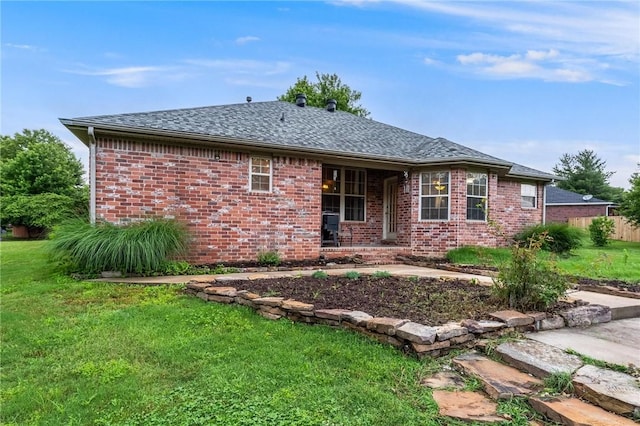 4931 Dogwood, Springdale, AR 72762 - back of property featuring a lawn, brick siding, and a shingled roof