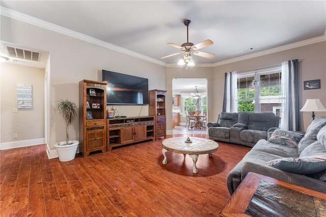 4931 Dogwood, Springdale, AR 72762 - living area featuring wood finished floors, a chandelier, ornamental molding, baseboards, and ceiling fan