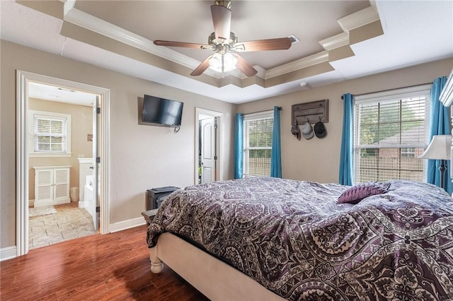 4931 Dogwood, Springdale, AR 72762 - bedroom featuring a raised ceiling, ornamental molding, wood finished floors, multiple windows, and baseboards
