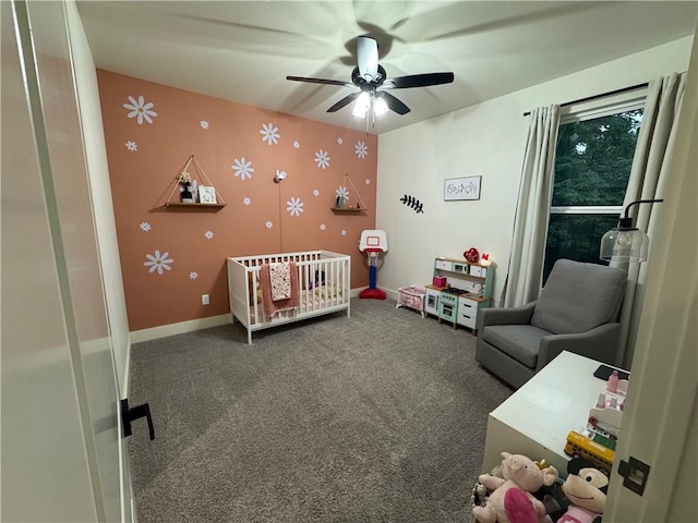 1 Llanon Cir, Bella Vista, AR 72714 - carpeted bedroom with wallpapered walls, a nursery area, baseboards, and a ceiling fan