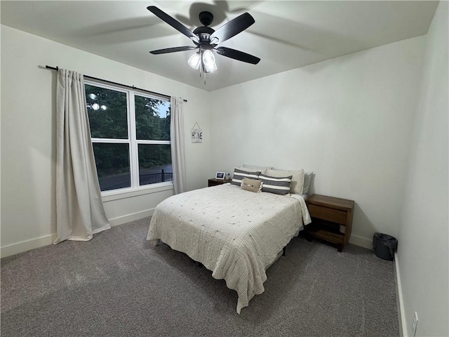 1 Llanon Cir, Bella Vista, AR 72714 - carpeted bedroom with baseboards and a ceiling fan