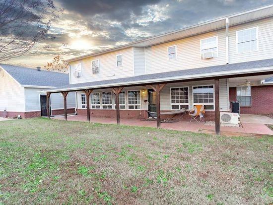 405-407 Rena Rd, Van Buren, AR 72956 - back of property featuring a patio area and a yard