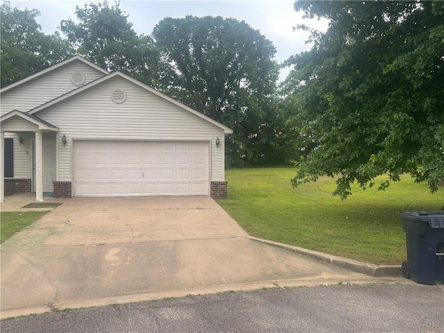9 Cypress Ct, Clarksville, AR 72830 - view of front of home with concrete driveway, a front yard, and a garage