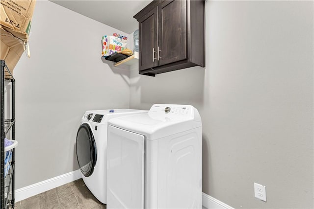 200 Post Oak Ave, Gentry, AR 72734 - laundry area with cabinet space, washing machine and clothes dryer, and baseboards