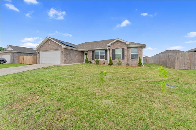 200 Post Oak Ave, Gentry, AR 72734 - ranch-style house featuring brick siding, driveway, solar panels, and a garage