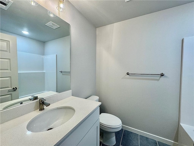 480 S Benchmark Ln, Fayetteville, AR 72704 - full bathroom with tile patterned floors, toilet, vanity, and baseboards