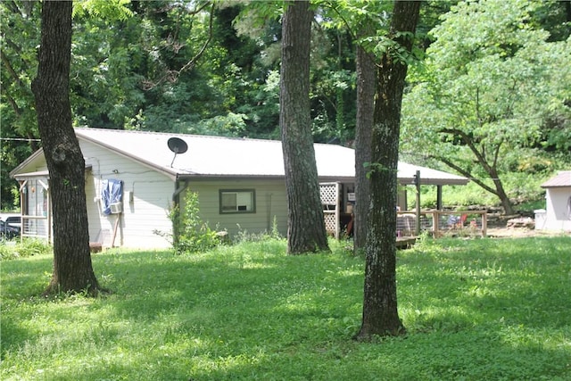 197 7th St, Saint Paul, AR 72756 - rear view of house with a lawn