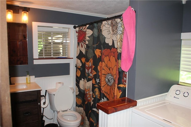 197 7th St, Saint Paul, AR 72756 - bathroom with washer / clothes dryer, wainscoting, vanity, ornamental molding, and toilet