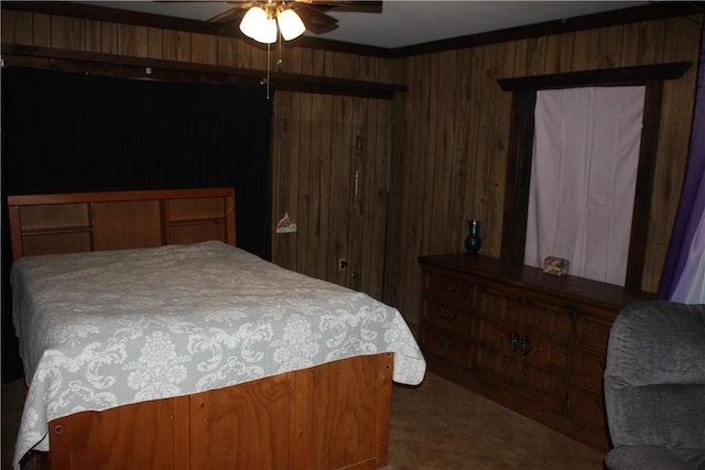 197 7th St, Saint Paul, AR 72756 - bedroom featuring wood walls, ceiling fan, and carpet floors