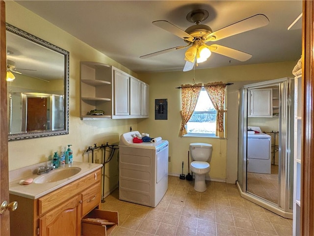 102 Pecan St, Marshall, AR 72650 - full bathroom with washer / clothes dryer, ceiling fan, vanity, and electric panel