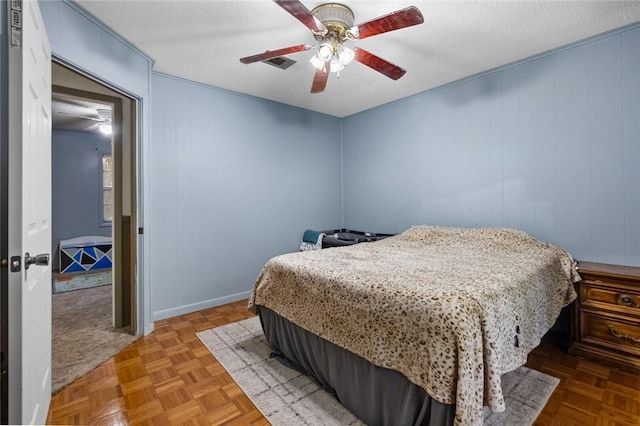 2 Tenbury Ln, Bella Vista, AR 72714 - bedroom with a ceiling fan, baseboards, and a textured ceiling