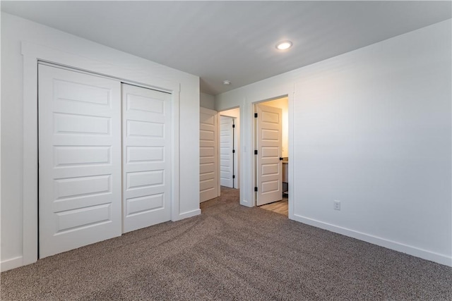 1071 Kentucky Ave, Bentonville, AR 72713 - unfurnished bedroom with carpet flooring, a closet, recessed lighting, and baseboards