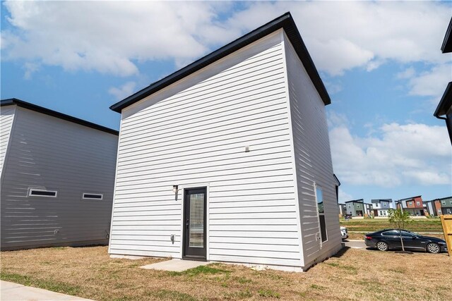 1071 Kentucky Ave, Bentonville, AR 72713 - back of house with a yard