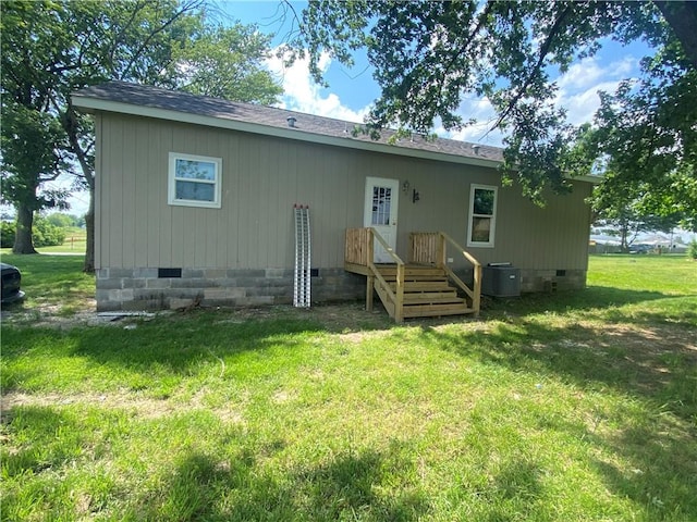 924 W Ave, Lincoln, AR 72744 - rear view of house with crawl space, a yard, central AC unit, and a shingled roof
