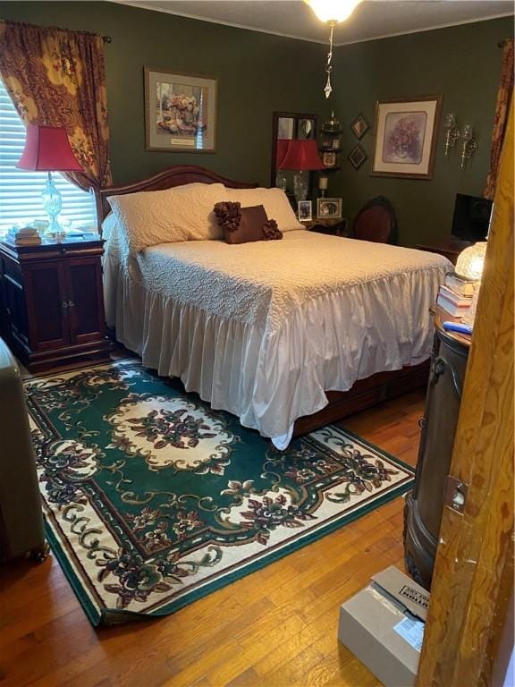 924 W Ave, Lincoln, AR 72744 - bedroom featuring wood finished floors