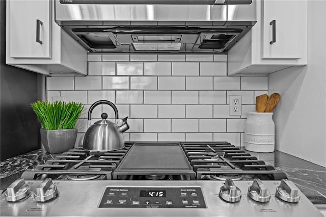 1 Geyer Rd, Bentonville, AR 72712 - kitchen with backsplash, white cabinets, and exhaust hood