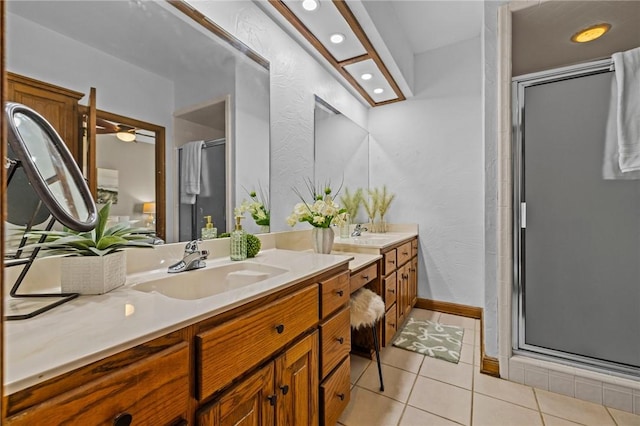 1 Geyer Rd, Bentonville, AR 72712 - full bath featuring vanity, a shower stall, tile patterned flooring, a textured wall, and recessed lighting