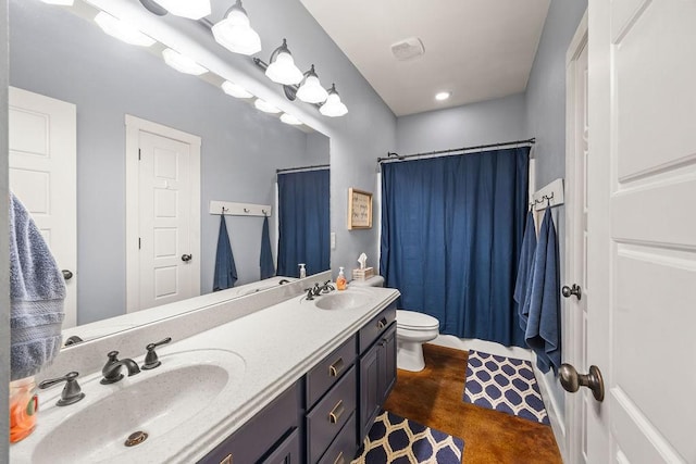 26 Primrose Ln, Bella Vista, AR 72714 - bathroom with toilet, double vanity, finished concrete floors, and a shower with shower curtain
